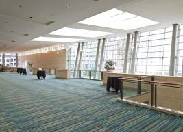 Spacious ballroom lobby with light from windows coming in 