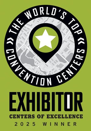 Green graphic with black text stating: Exhibitor Centers of Excellence 2025 Winner