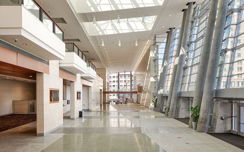 The empty main lobby of the Raleigh Convention Center in the daytime.