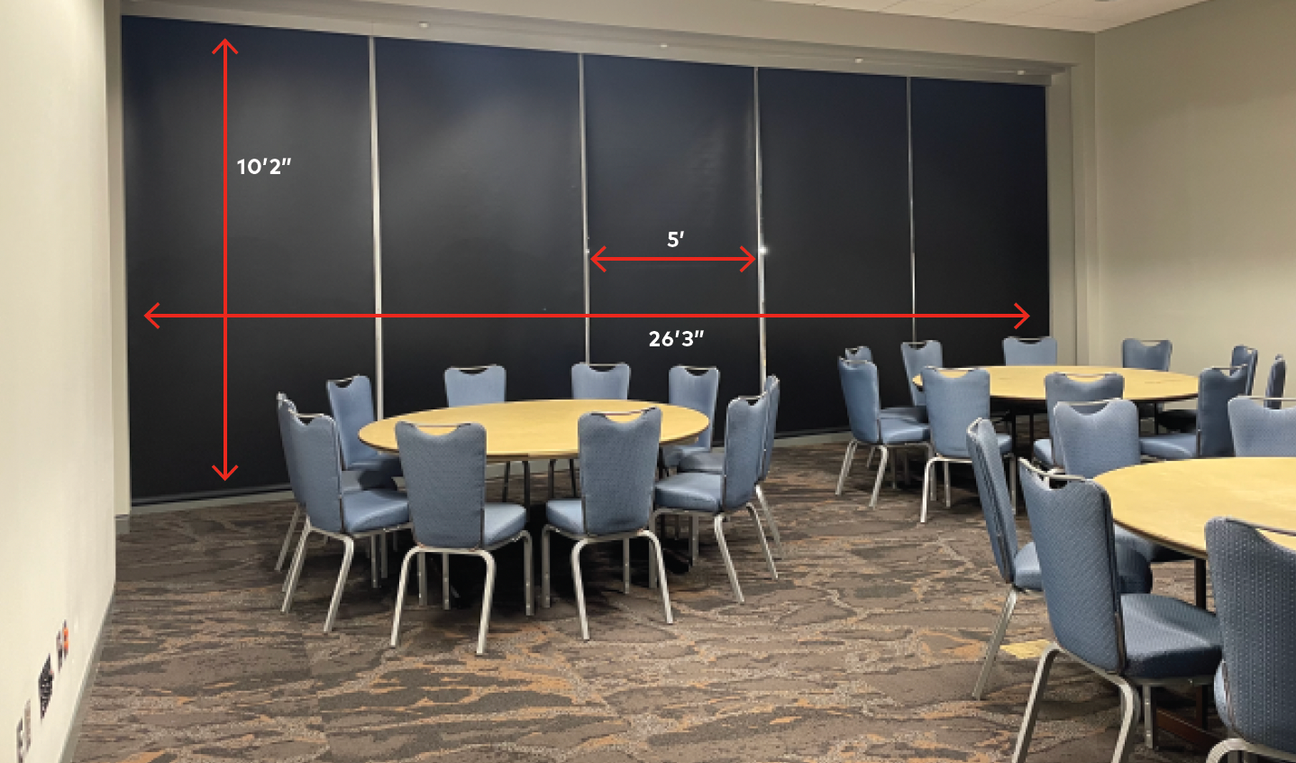 Room 204 with curtains closed. Five windows totalling 26'3" wide 10'2 in tall.