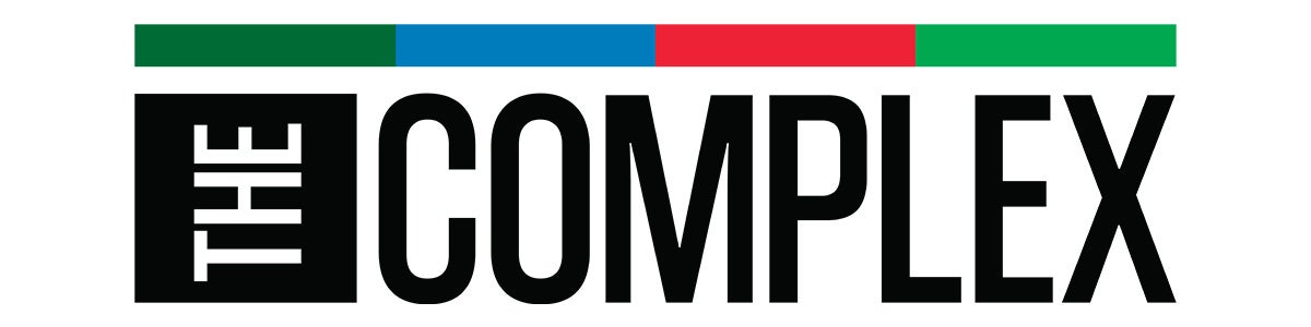 The Complex logo with rectangular bar on top with four colors: dark green, blue, red, and light green.