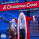 an image of Ebeneazer Scrooge and Tiny Tim the text above them reads A Christmas Carol
