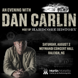 Dan Carlin headshot against dark background for Raleigh NC show of Host of Hardcore History 